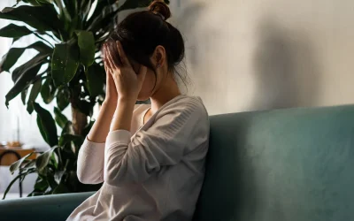 side-view-young-man-looking-through-window-scaled